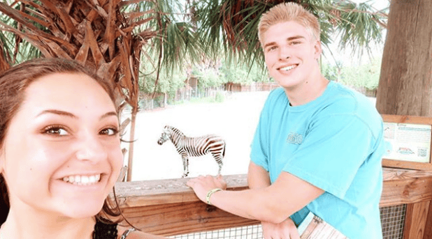 Teenagers walking through Wild Florida's Gator Park