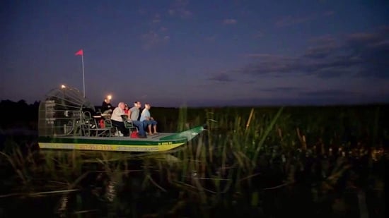 riding an airboat at night