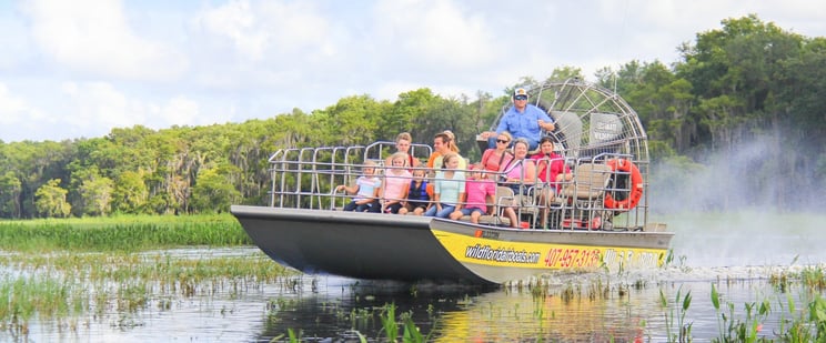 Group touring the Everglades in an airboat at Wild Florida